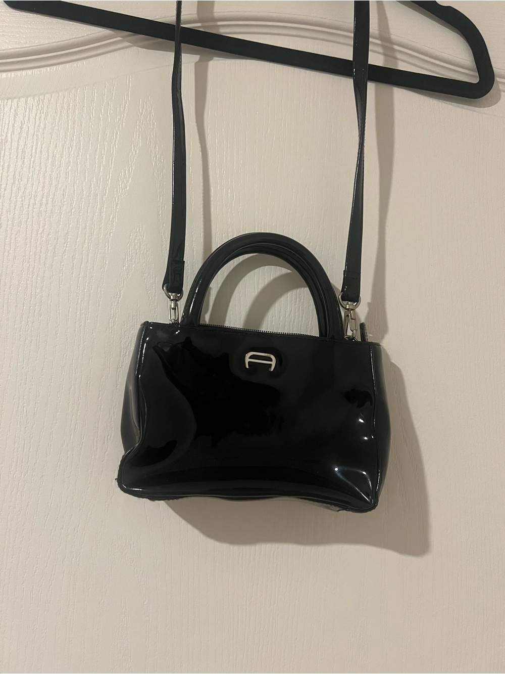 Vintage Etienne Aigner black patent leather satchel bag.